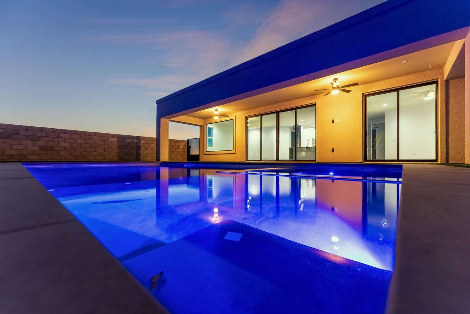 Twilight pool at 3556 Sunny Point Dr
