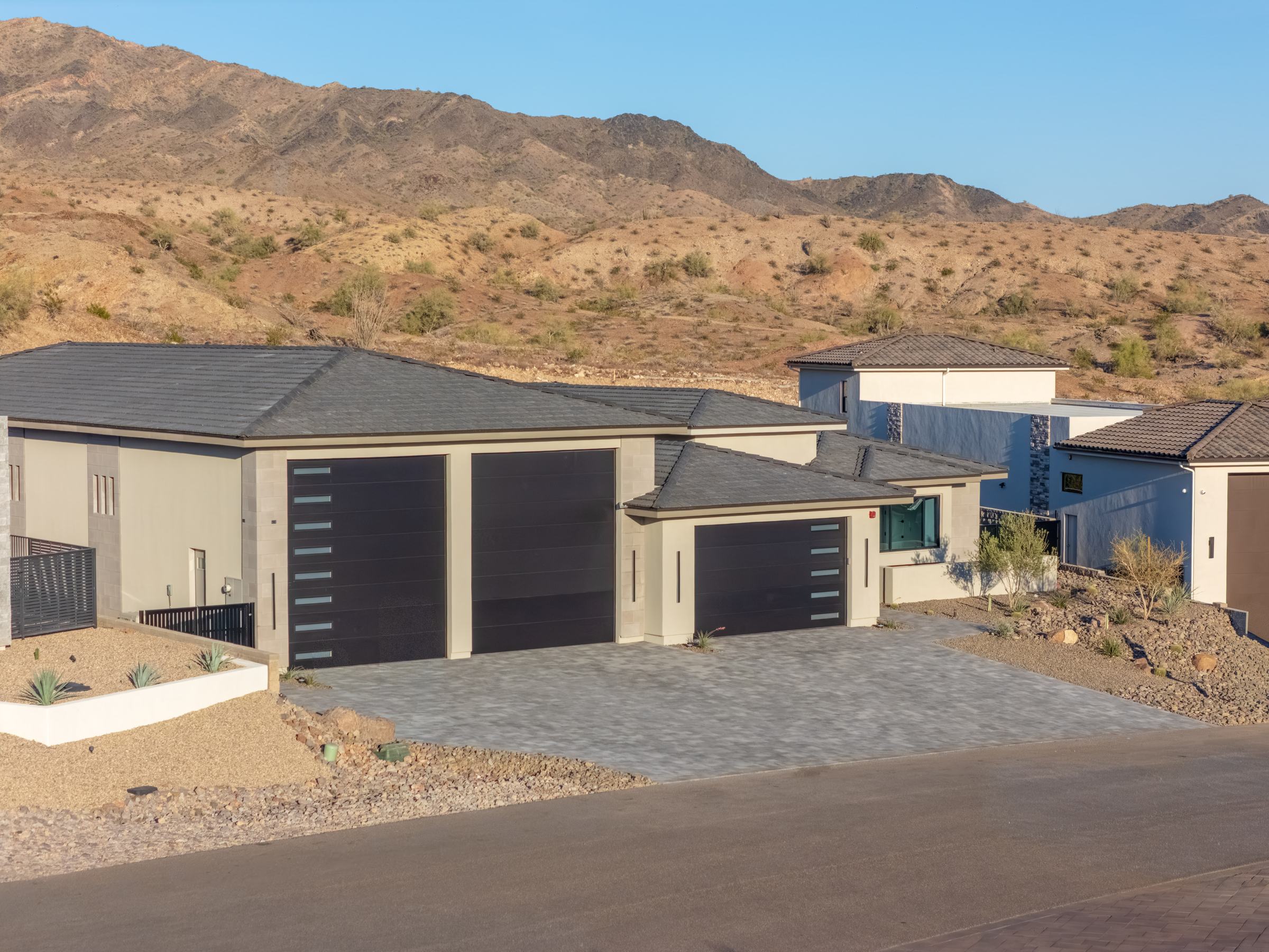 Aerial view of 6295 Avienda De Las Colinas against the Havasu Foothills hillside