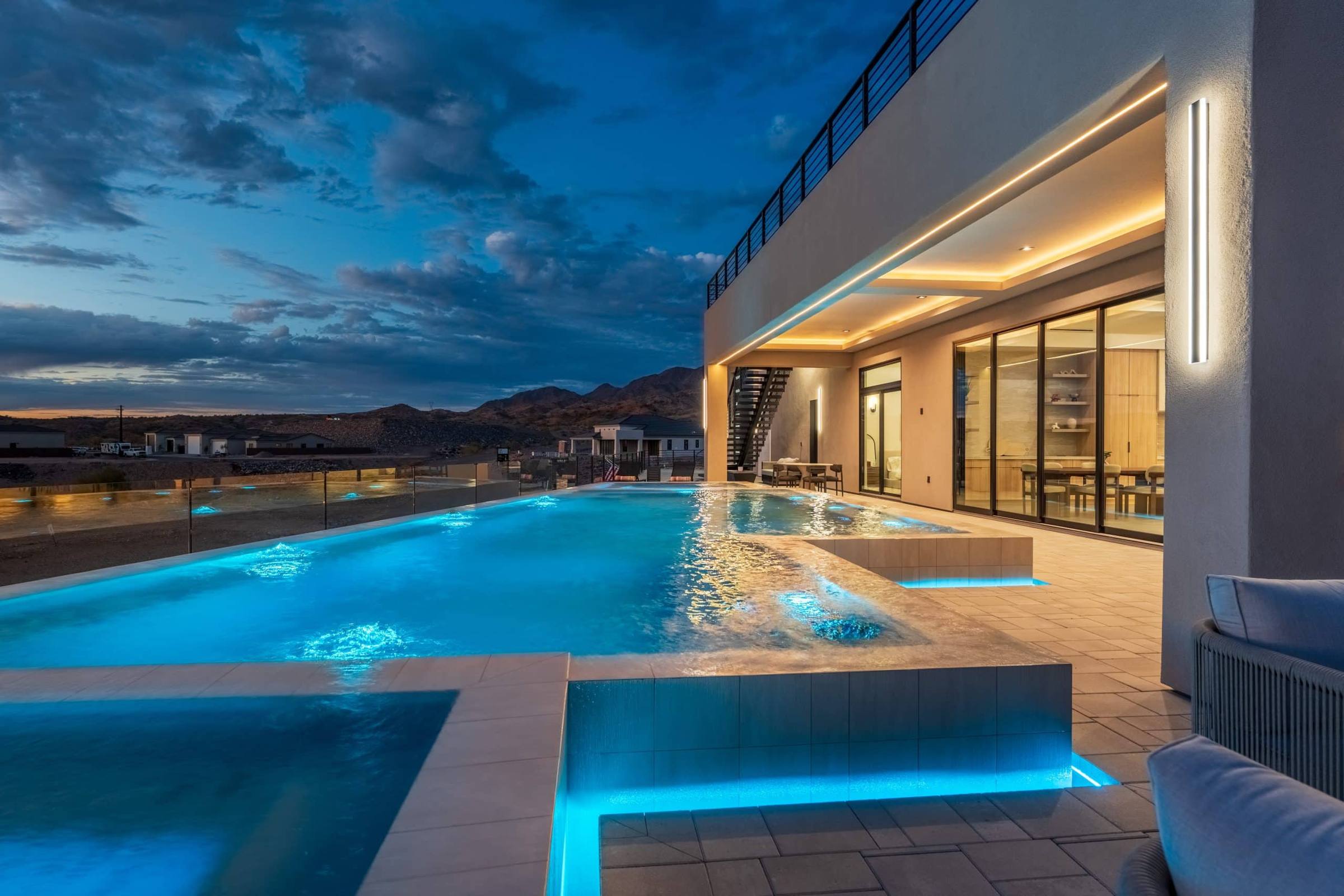 Twilight pool and covered patio at 6719 Corte De Los Bueyes, a Moran AZ Home